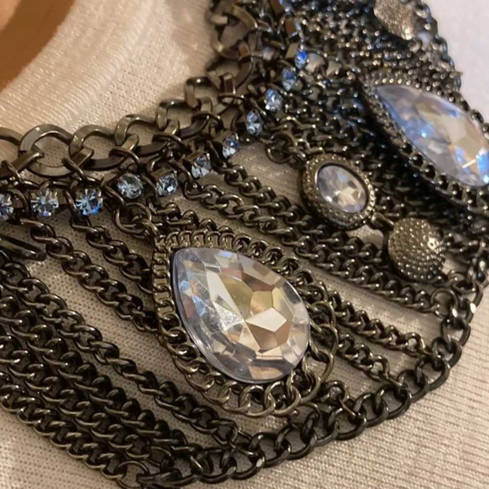 Gunmetal and blue rhinestone with faceted faux crystals statement necklace